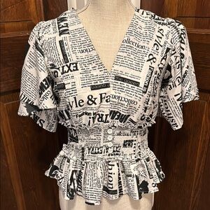 Live 4 Truth Black and White Newpaper Print Short Sleeve Blouse